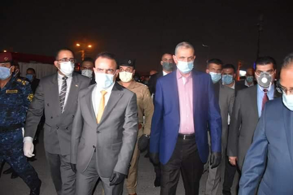 وزيرا الداخلية والصحة العراقيان يتجولان في شوارع بغداد مساء امس لمتابعة تطبيق حظر التجوال