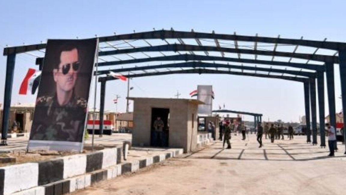 عناصر أمنية تابعة للنظام السوري عند معبر البركمال مع العراق في 30 سبتمبر الماضي
