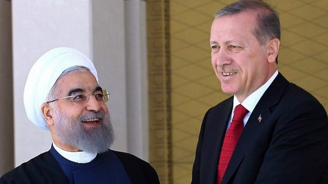 الرئيسان التركي رجب طيب إردوغان والإيراني حسن روحاني في صورة من الأرشيف