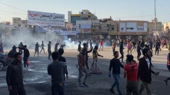 اشتباكات في ساحة الحبوبي وسط مدينة الناصرية