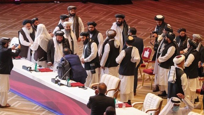 أعضاء وفد طالبان خلال محادثات السلام بين الحكومة الأفغانية وطالبان في الدوحة في 12 سبتمبر 2020.