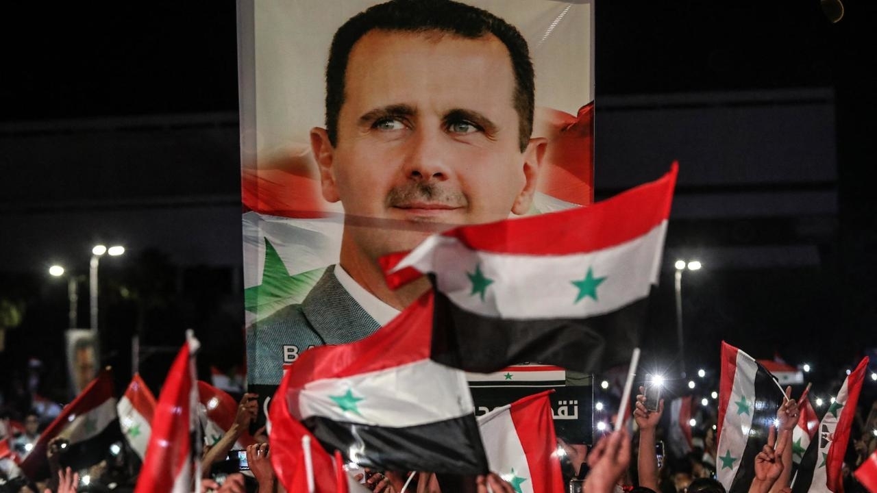 احتفالات في شوارع دمشق بفوز بشار الأسد بولاية رئاسية رابعة. 27 مايو/أيار 2021
