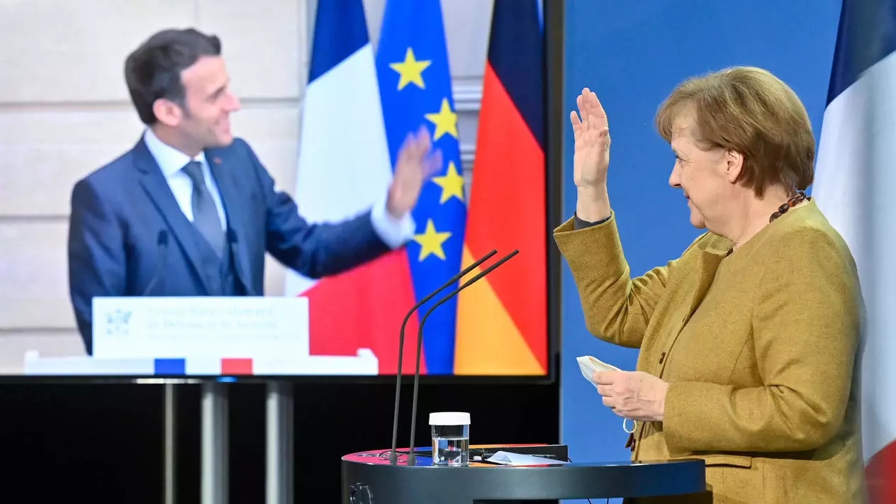 ماكرون يشيد بميركل في المجلس الوزاري الفرنسي-الألماني الأخير 