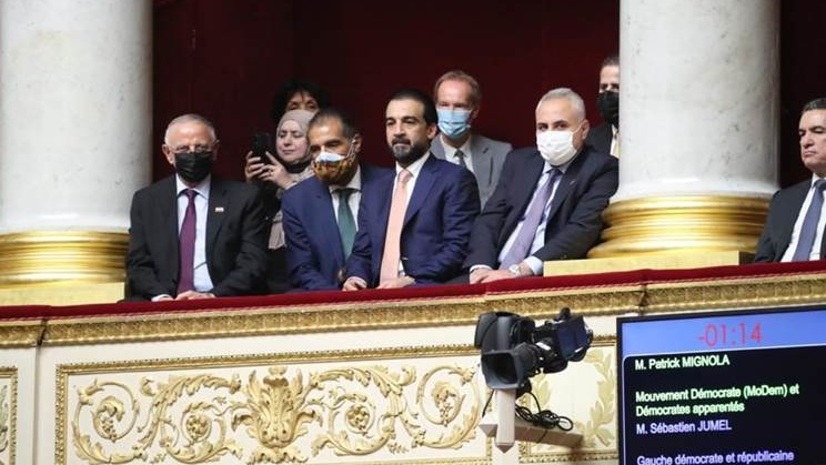 الحلبوسي مع نظيره الفرنسي في مبنى البرلمان بباريس