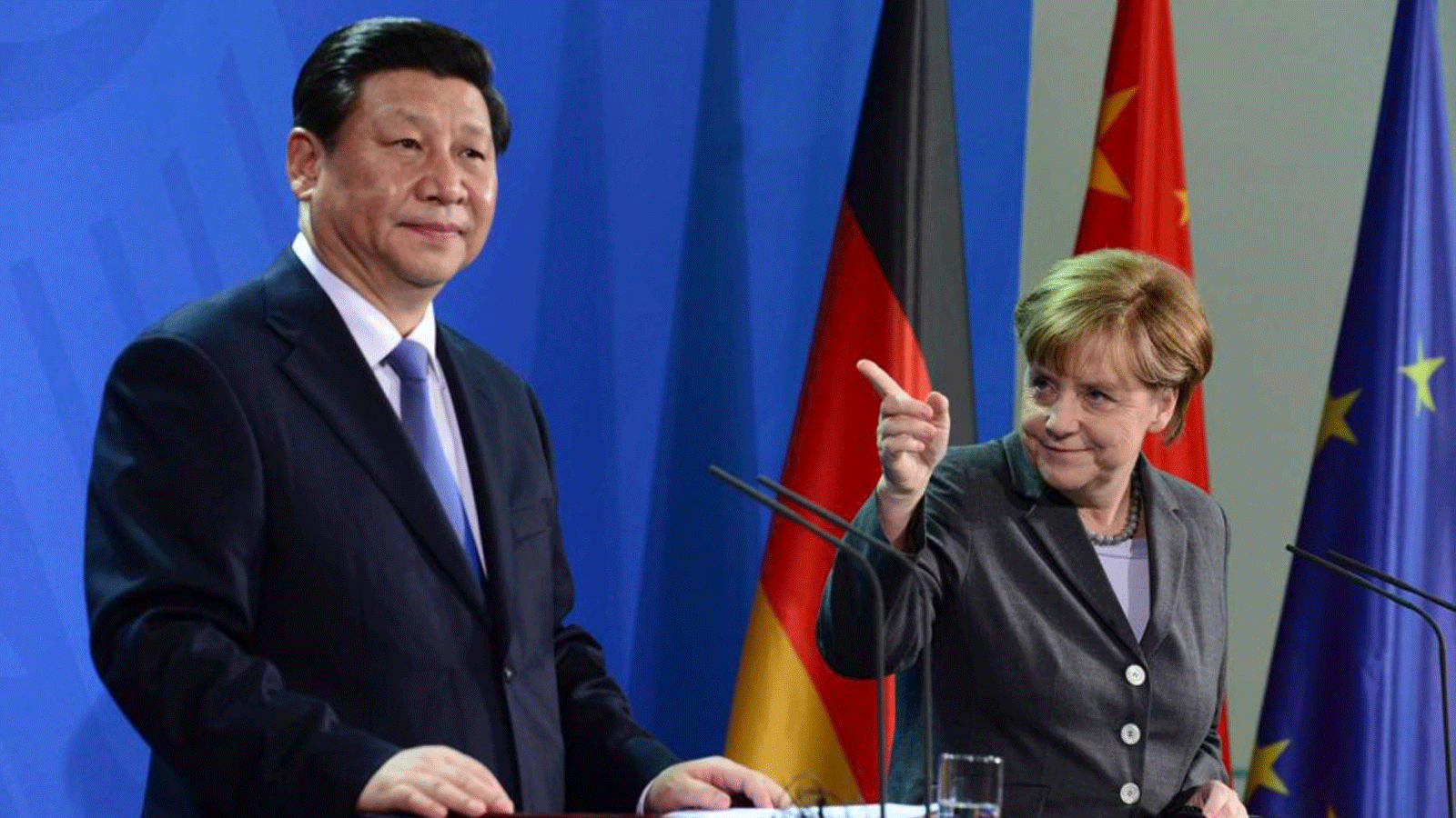 المستشارة الألمانية أنجيلا ميركل والرئيس الصيني شي جين بينغ(صورة أرشيفية)