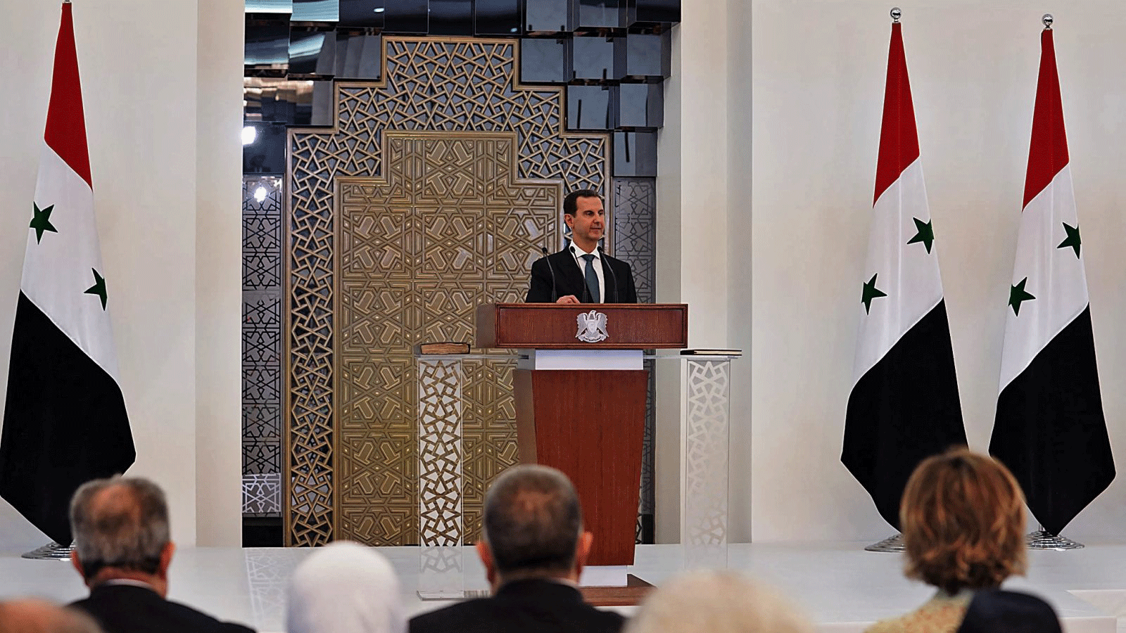 صورة نشرتها الصفحة الرسمية للرئاسة السورية على الفيسبوك تُظهر بشار الأسد وهو يلقي كلمة في مراسم أداء اليمين لولايته الرابعة، في العاصمة دمشق، سوريا. 17 تموز/ يوليو 2021