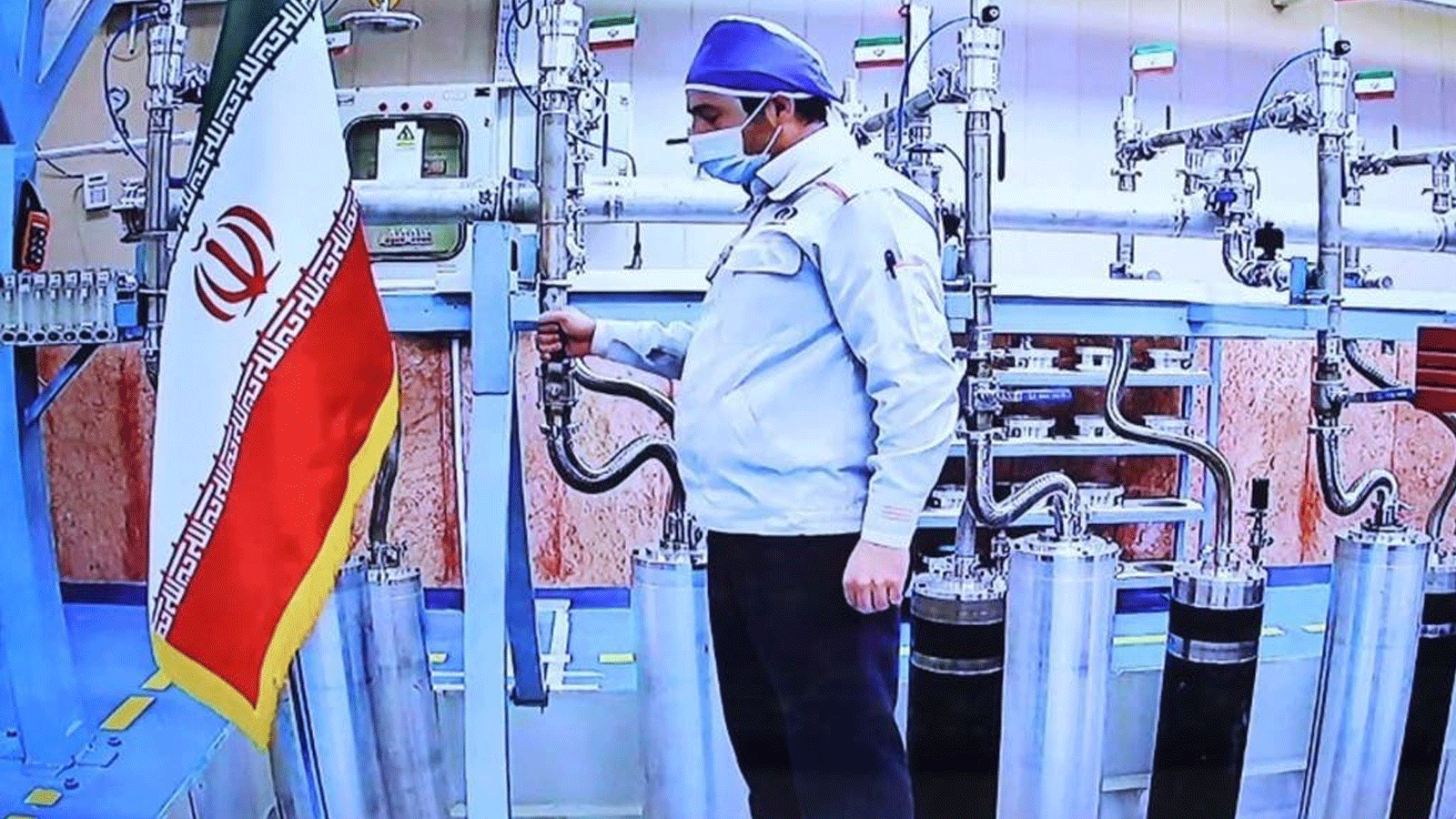 صورة لشاشة مؤتمر بالفيديو تُظهر محرّكا داخل مصنع نطنز لتخصيب اليورانيوم في إيران، قدمها المكتب الرئاسي الإيراني في 10 أبريل/ نيسان 2021 
