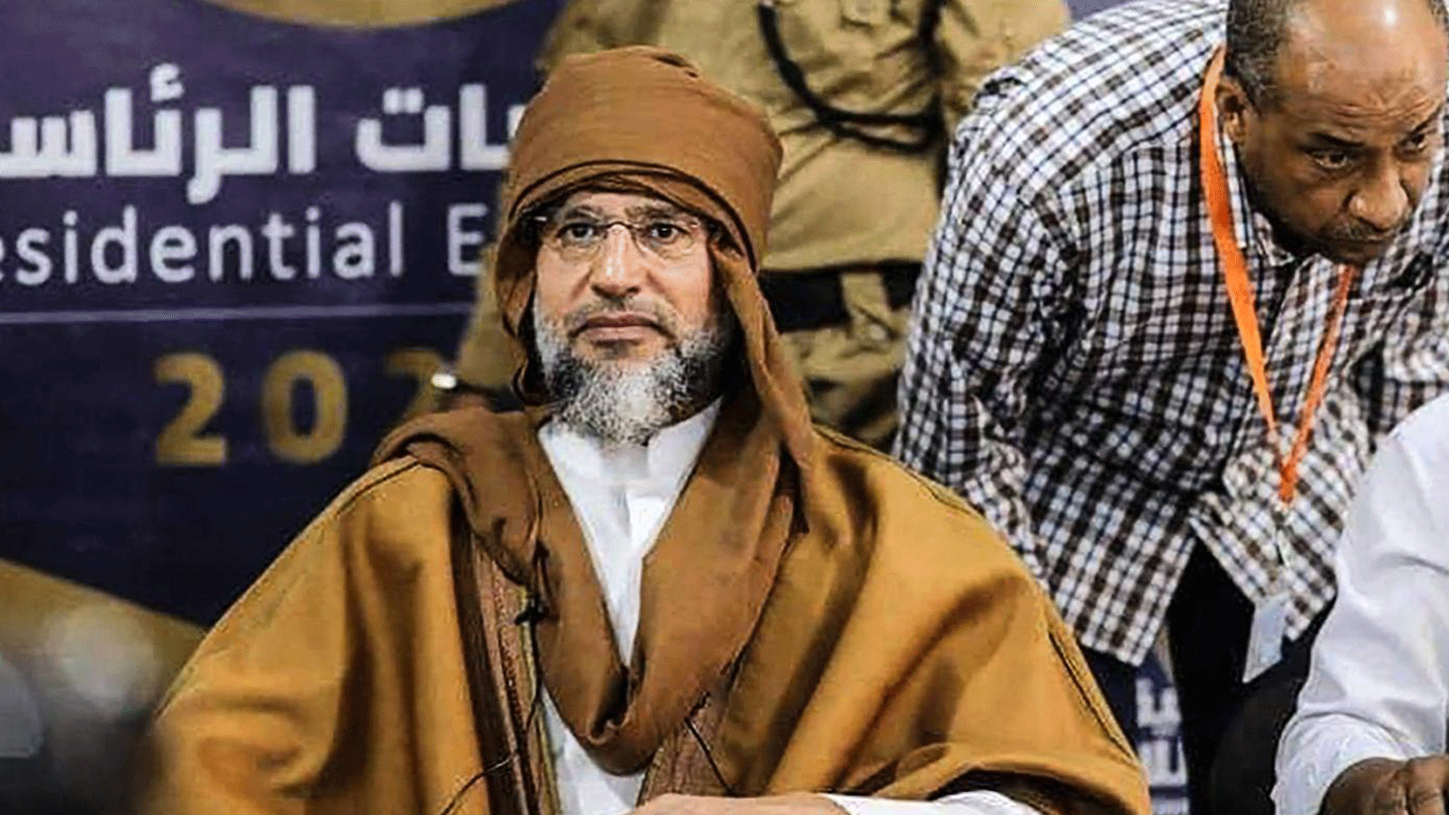 سيف الإسلام القذافي إيان إطلاق حملته لرئاسة ليبيا في مدينة سبها الجنوبية في 14 تشرين الثاني/نوفمبر 2021