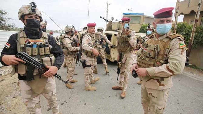 القوات العراقية تبحث في منطقة الطارمية على بعد 35 كيلومترا شمال بغداد في 20 فبراير 2021 بعد اشتباكات مع مقاتلي تنظيم الدولة الإسلامية