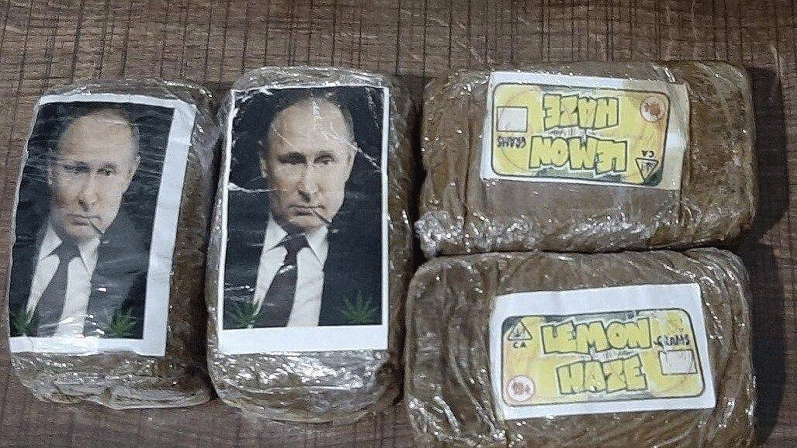 صورة متداولة عبر تويتر لحزم المخدرات المختومة برسم الرئيس الروسي فلاديمير بوتين