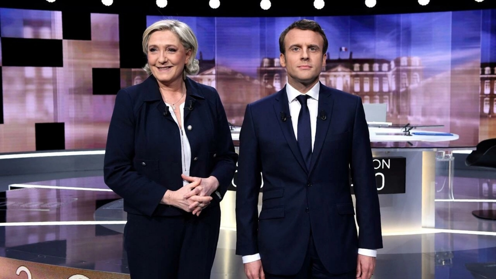 الرئيس الفرنسي المنتهية ولايته إيمانويل ماكرون، وزعيمة اليمين المتطرف مارين لوبن