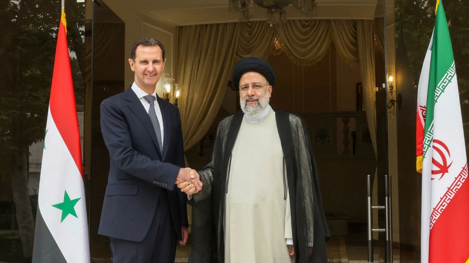 الرئيسان السوري بشار الأسد والإيراني ابراهيم رئيسي
