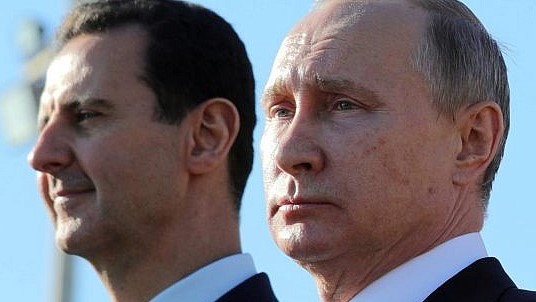 الرئيسان الروسي فلاديمير بوتين والسوري بشار الأسد في صورة من الأرشيف
