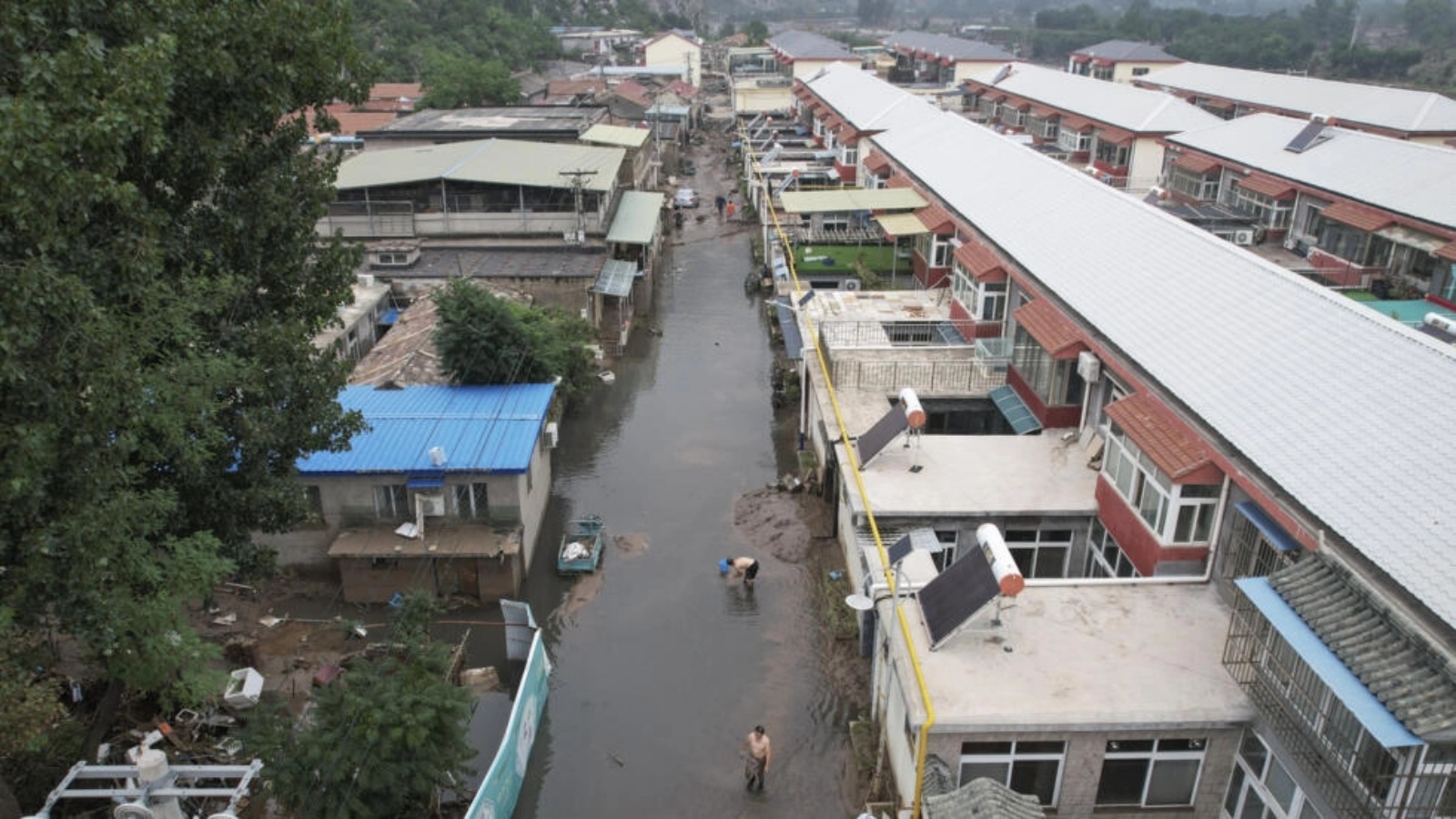 قرية اجتاحتها فيضانات إثر هطول أمطار غزيرة على العاصمة الصينية بكين، في صورة جوية التقطت في 3 أغسطس 2023