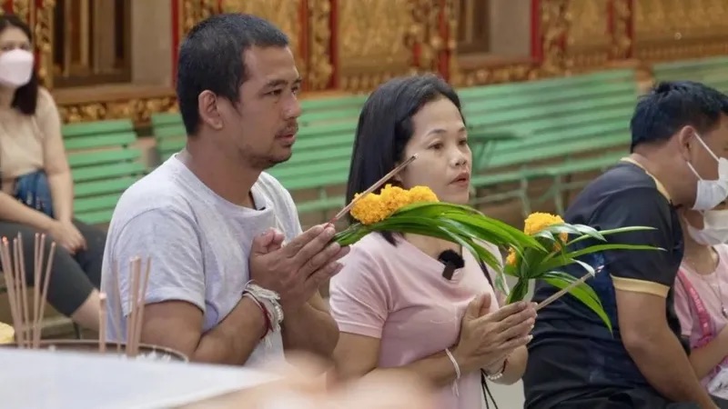 BBC/ LULU LUO | ويشيان وزوجته في تايلاند