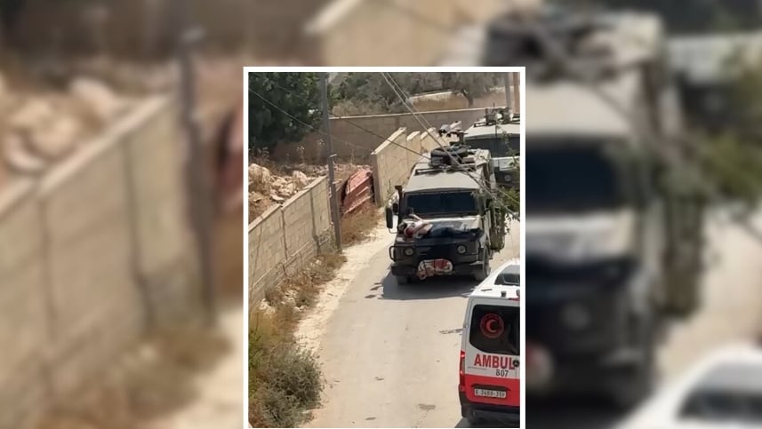 الجريح الفلسطيني مقيداً في مقدمة السيارة الاسرائيلية