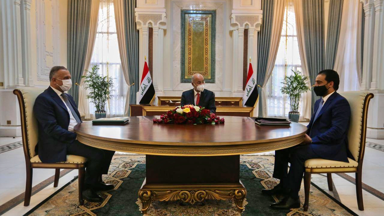 الرؤساء العراقيون للجمهورية والحكومة والبرلمان خلال اجتماع سابق