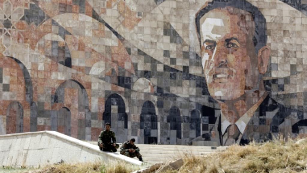 جدارية تمثل الرئيس السوري السابق حافظ الأسد في دمشق