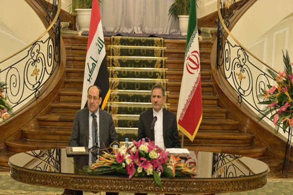 المالكي ونائب الرئيس الايراني جهانغيري خلال مؤتمرهما الصحافي في طهران