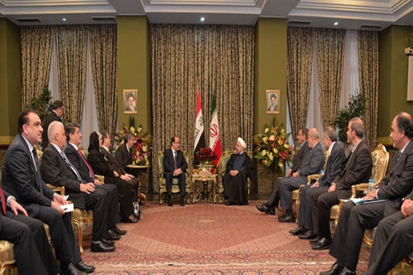 الوفدان العراقي برئاسة المالكي والايراني برئاسة روحاني خلال اجتماعهما في طهران
