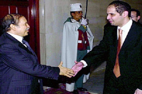 رفيق عبد المؤمن خليفة مع الرئيس الجزائري