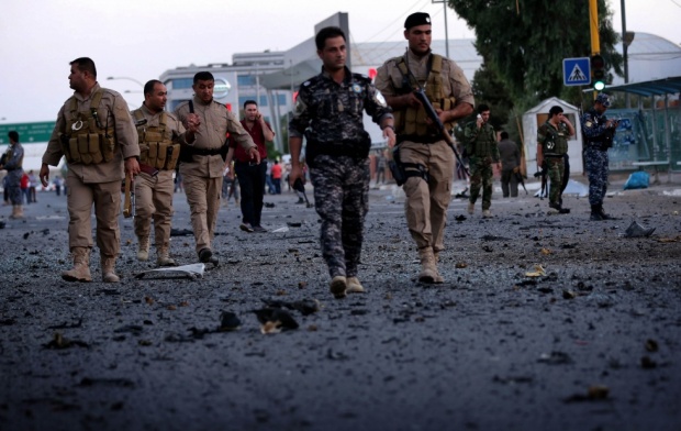 رجال أمن عراقيون في اربيل بعد وقوع احد الانفجارات- ارشيف