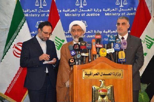 وزيرا العدل العراقي والايراني خلال مؤتمرهما الصحافي