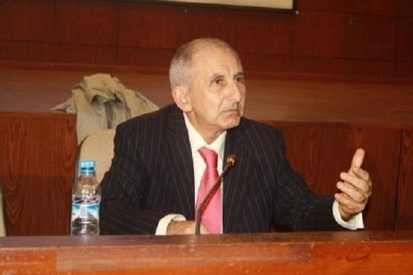 تاج الدين الحسيني، الباحث والأستاذ في جامعة محمد الخامس بالرباط