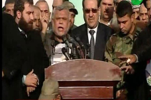 المالكي خلال مشاركته في تظاهرة الرفض للتوغل التركي في الاراضي العراقية