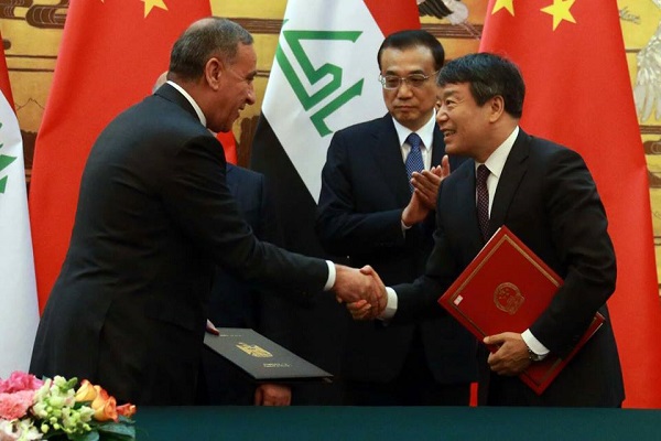 جانب من توقيع الإتفاقيات بين الصين والعراق
