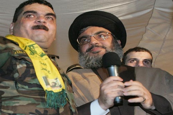 سمير القنطار إلى جانب أمين عام حزب الله