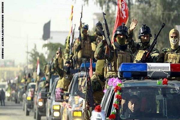 قوات عراقية مدعومة بالحشد الشعبي للمتطوعين