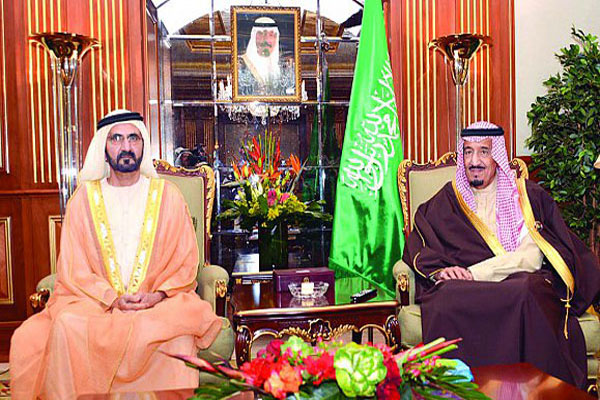 العاهل السعودي مجتمعًا بحاكم دبي