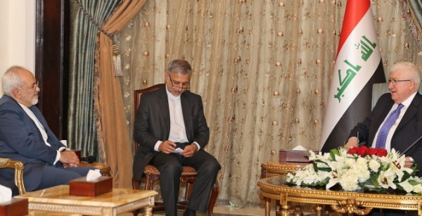 الرئيس العراقي مستقبلا وزير الخارجية الإيراني