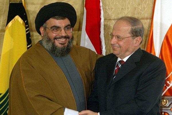 ميشال عون إلى جانب أمين عام حزب الله حسن نصر الله