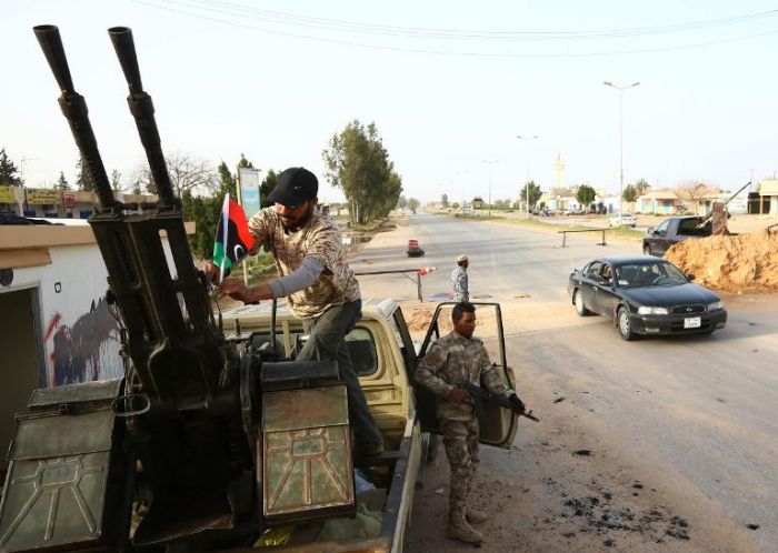 الحكومة البريطانية تدافع عن تدخلها العسكري في ليبيا