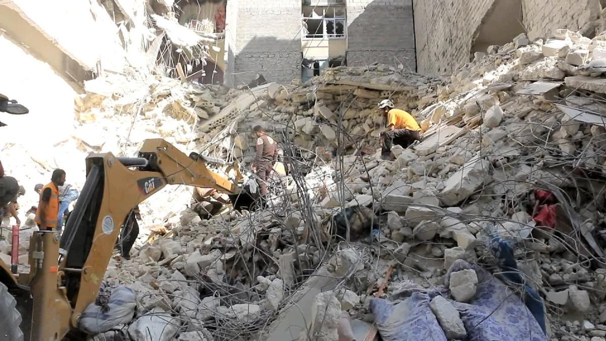 العثور على 21 جثة لمدنيين في حلب الشرقية