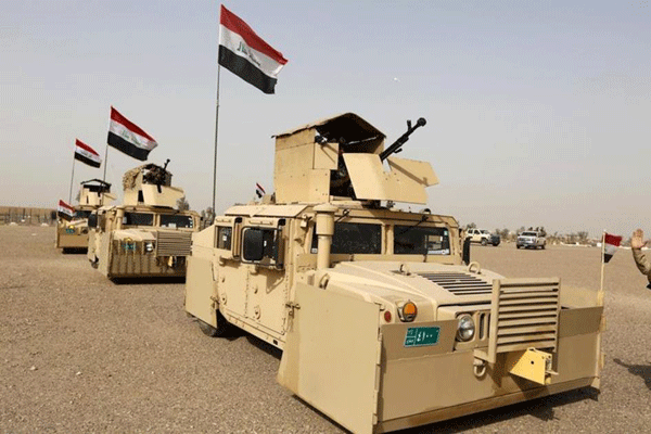 قوات عراقية مدرعة متوجهة الى تحرير الموصل