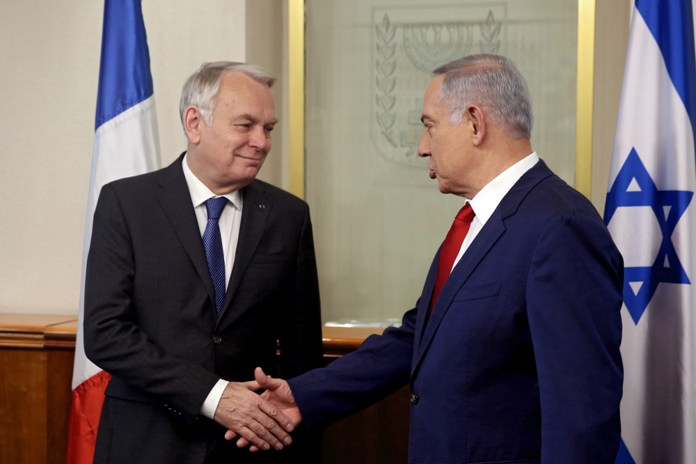 نتانياهو يشكك في حياد فرنسا إزاء مبادرة السلام بعد تصويت اليونيسكو 