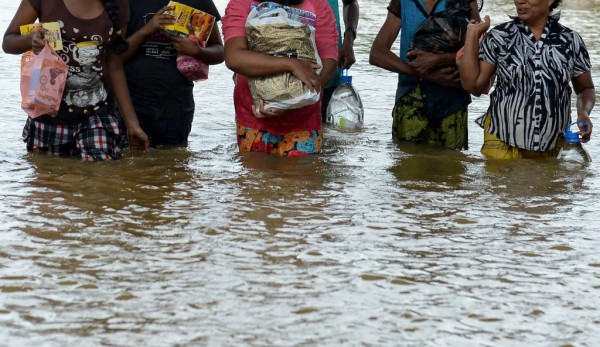 بدء وصول المساعدات الاجنبية الى سريلانكا مع بدء انحسار الفيضانات