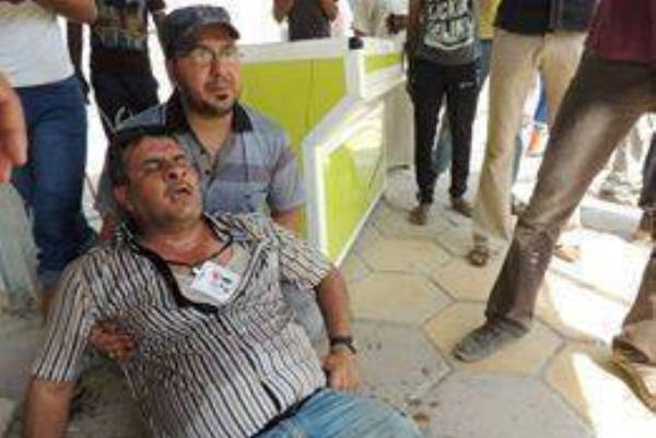 صحافي عراقي اصيب باعتداء لقوات الامن