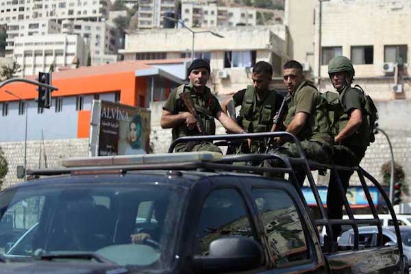 هيومن رايتس: الامن الفلسطيني يعتدي بالضرب على منتقديه