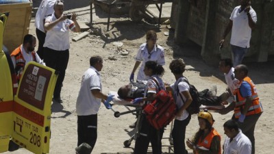 انتشال جثة سادسة من انقاض مبنى المرأب في تل ابيب