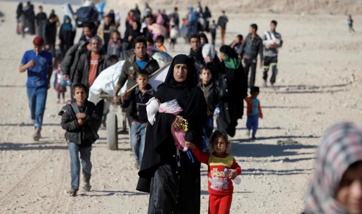 مدنيون عراقيون خائفون يفرون من جحيم المعارك في الموصل