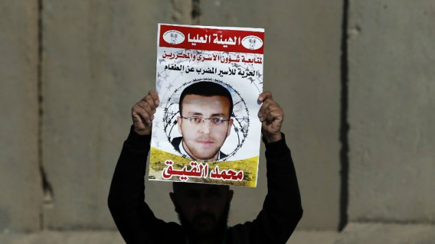 العفو الدولية تطالب اسرائيل باطلاق سراح صحافي فلسطيني