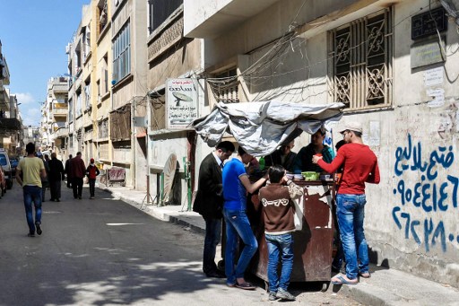 دفعة رابعة من المقاتلين تغادر حي الوعر في حمص