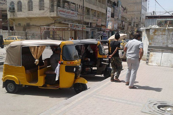 عربة «التوك توك» تغزو أسواق وشوارع بغداد