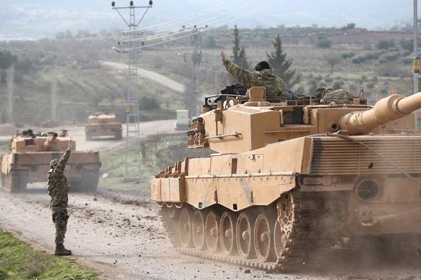 أردوغان يهدد بتوسيع الهجوم إلى مدن أخرى في شمال سوريا