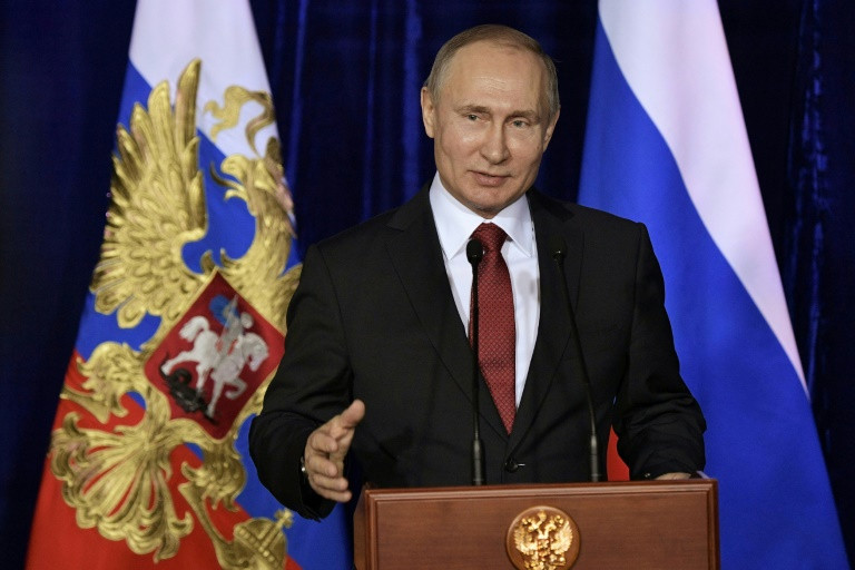 بوتين يخوض حملة بالحد الأدنى قبل شهر من الانتخابات الروسية