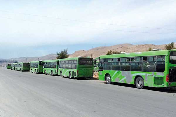 حافلات تقلّ مقاتلين من جيش الإسلام تغادر دوما